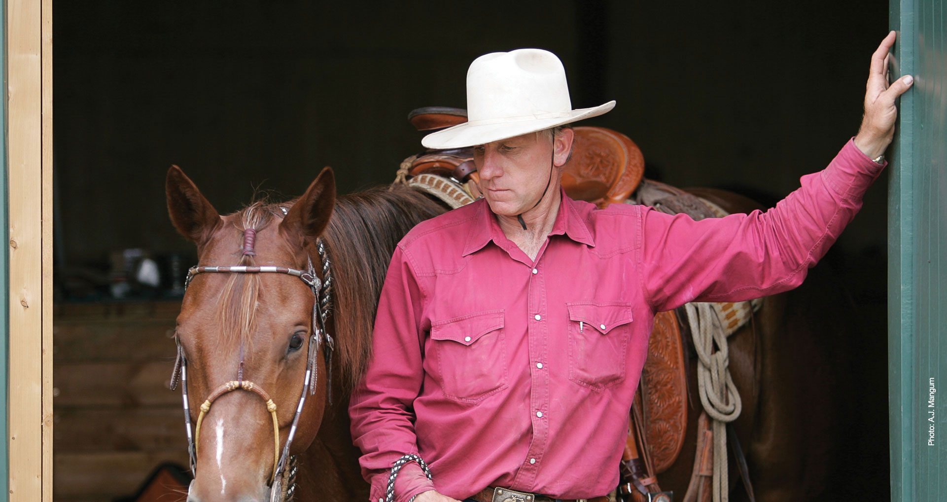 Buck and his horse in a doorway